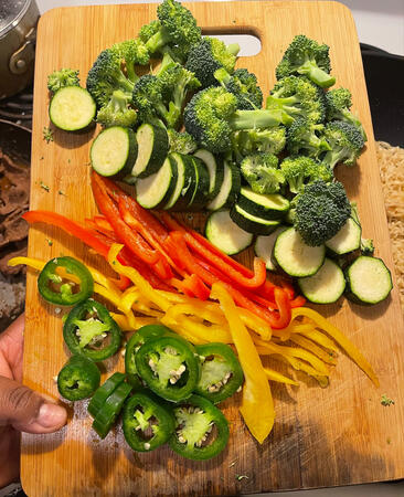 Chopped jalapeños, peppers, zucchini, and broccoli