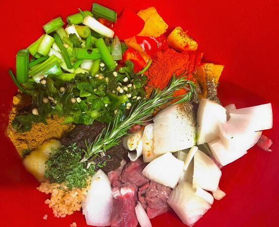 Fresh vegetables and Caribbean spices for Jamaican beef stew marinade