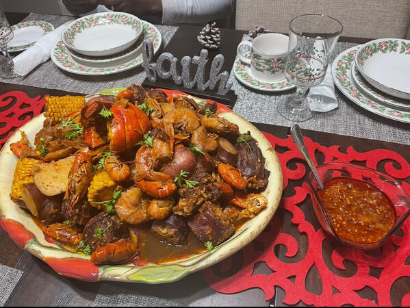 West African seafood boil with lobster, crawfish, shrimp, and smoked turkey necks