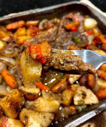 Slow-roasted pork with potatoes and carrots